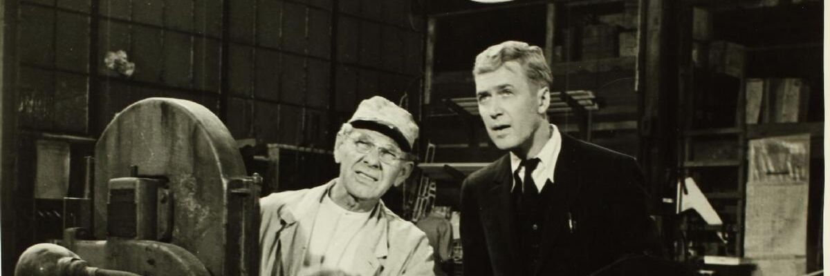 Producer Leland Hayward and James Stewart as Lindbergh with the Spirit replica for the movie "The Spirit of St. Louis".