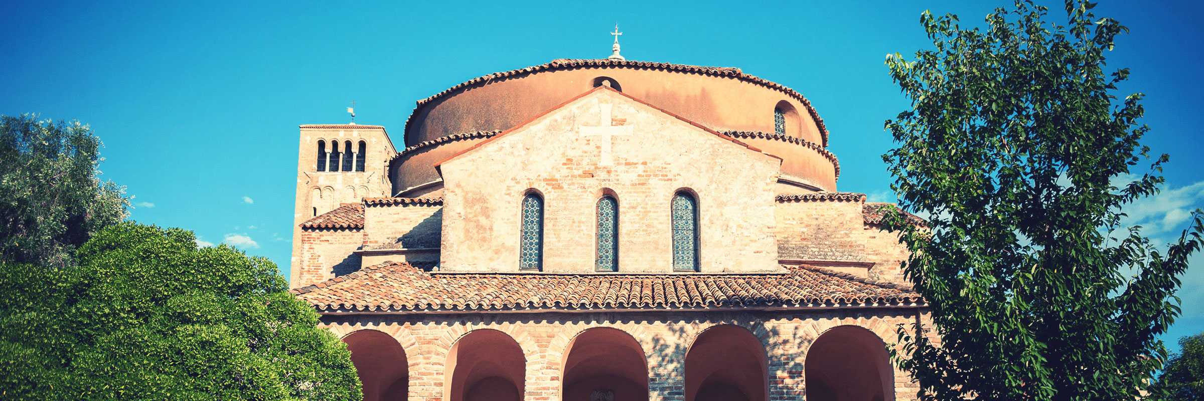 Detail of the facade of the Church of Santa Fosca in Torcello — (Archivio Bazzmann/Venipedia).