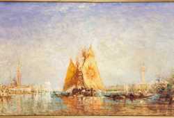Trabaccolo with yellow sail, in the Venice lagoon